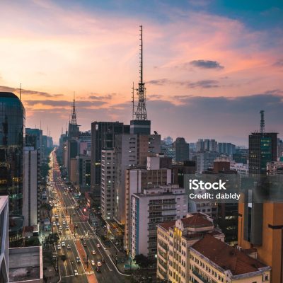 Aerial View of Paulista Avenue Buildings Sao Paulo City by Colorful Sunset.